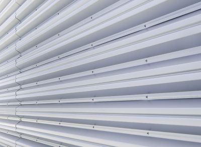 Siding panels being aligned